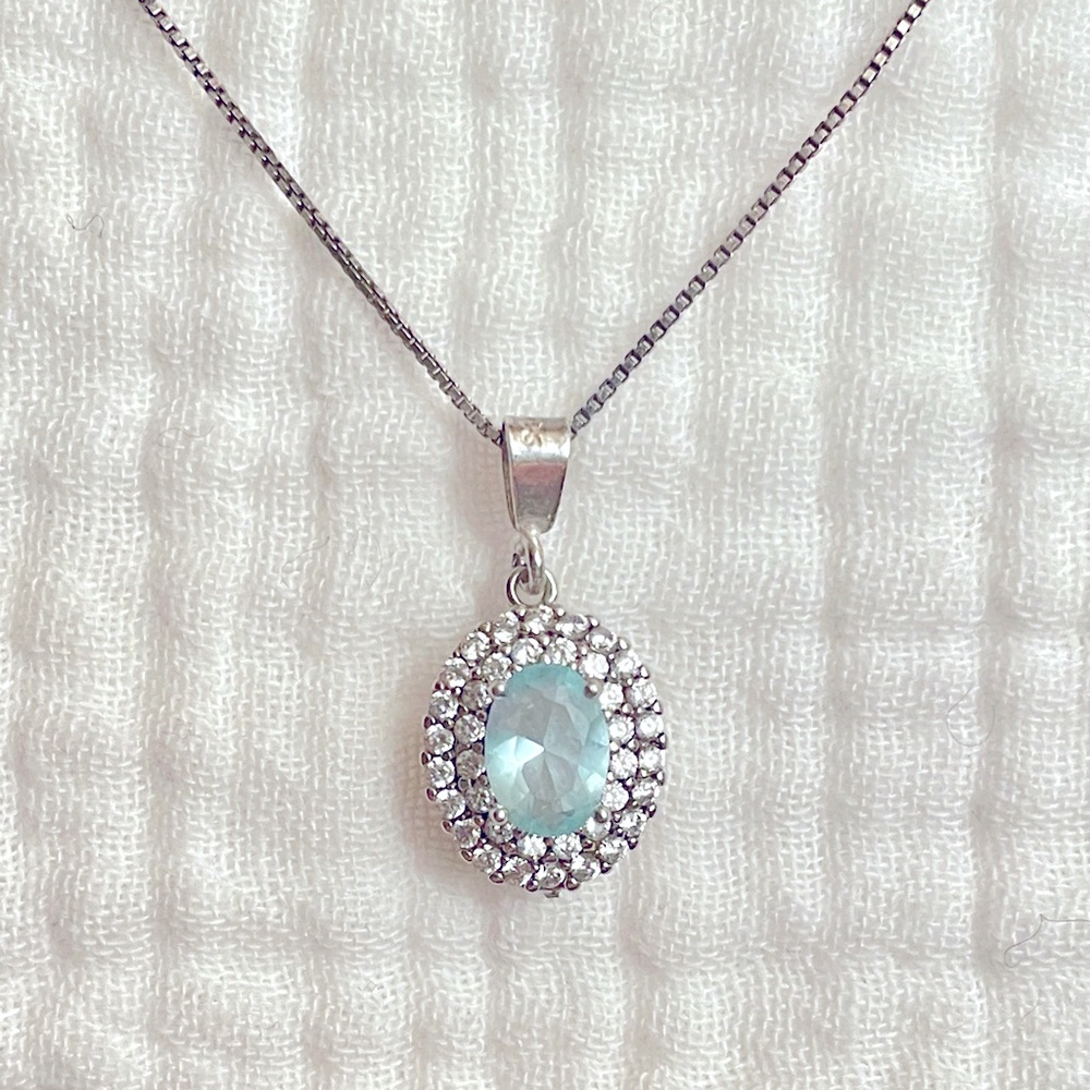Sterling Silver Aquamarine and White Topaz Oval Double Halo Pendant 18” Necklace